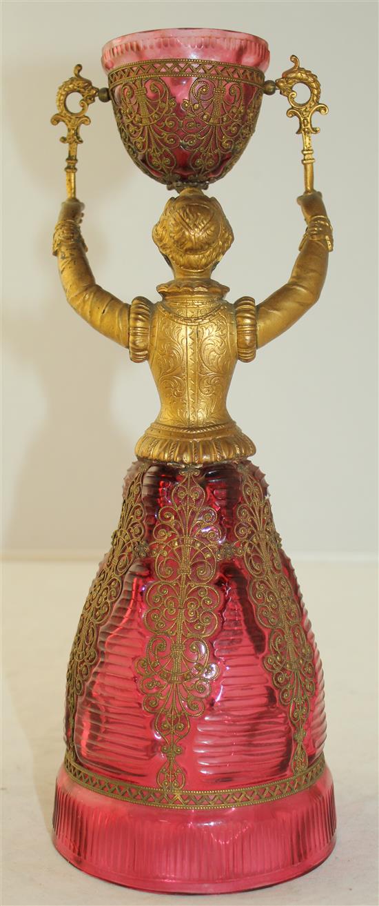 A German ruby glass and gilt metal figural marriage cup, probably Fritz Heckert, late 19th century, 26.5cm